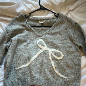 Gray V-Neck Sweater with White Bow